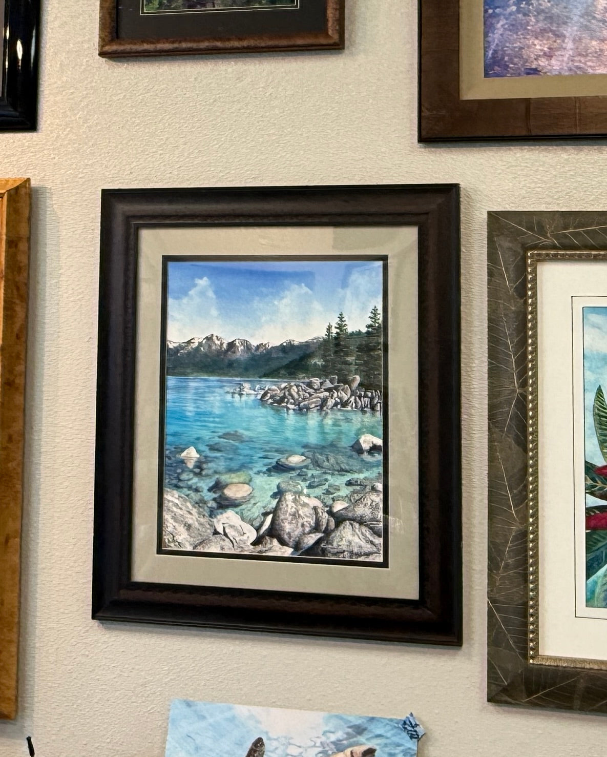 Clear Awakening original watercolor by Christie Marie Elder depicting turquoise Lake Tahoe water granite rocks and Sierra Nevada mountains hanging in Kauai Christie's Art Gallery
