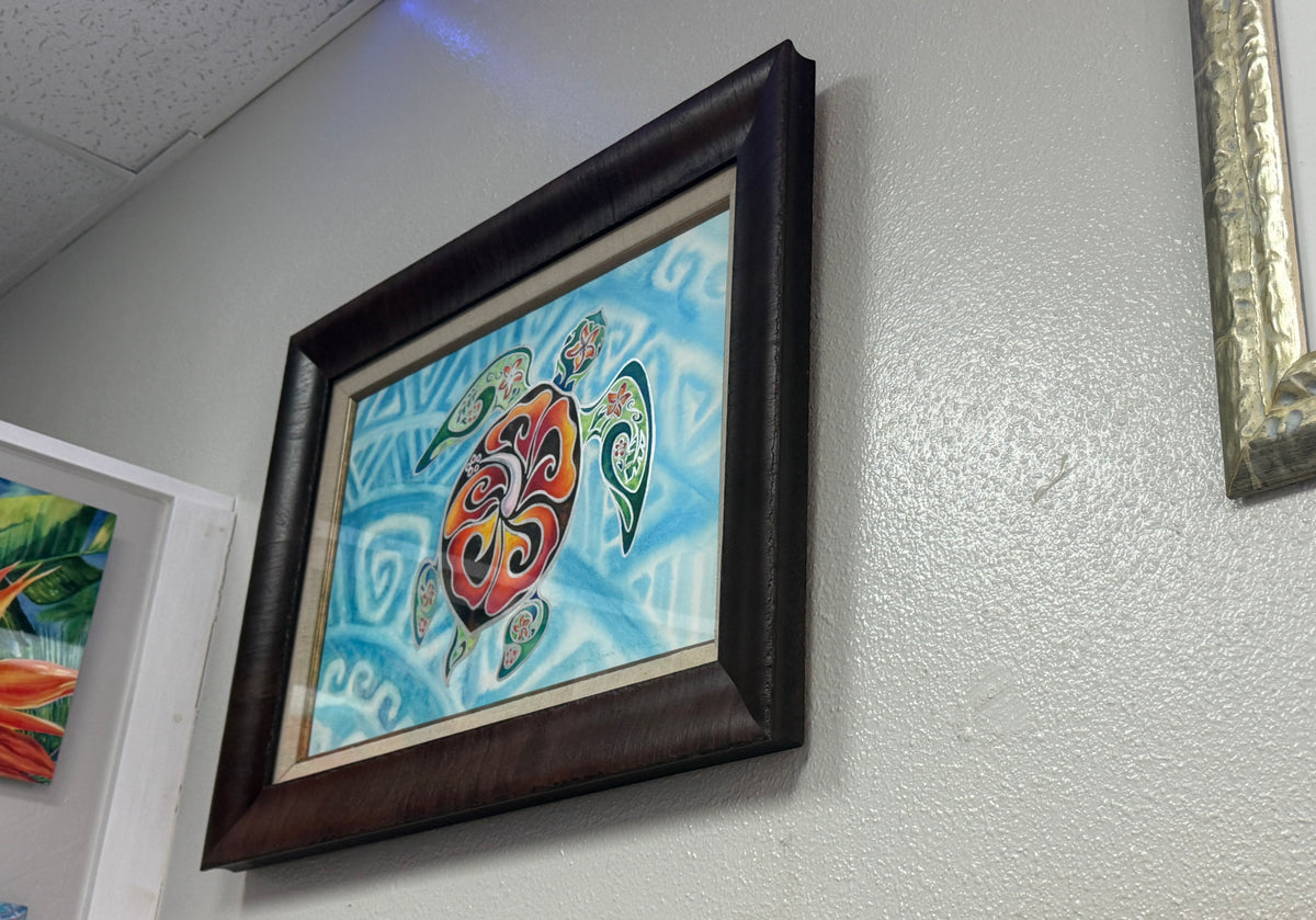 
Side view of framed Nani Honu original watercolor showing the substantial wood frame and finished presentation