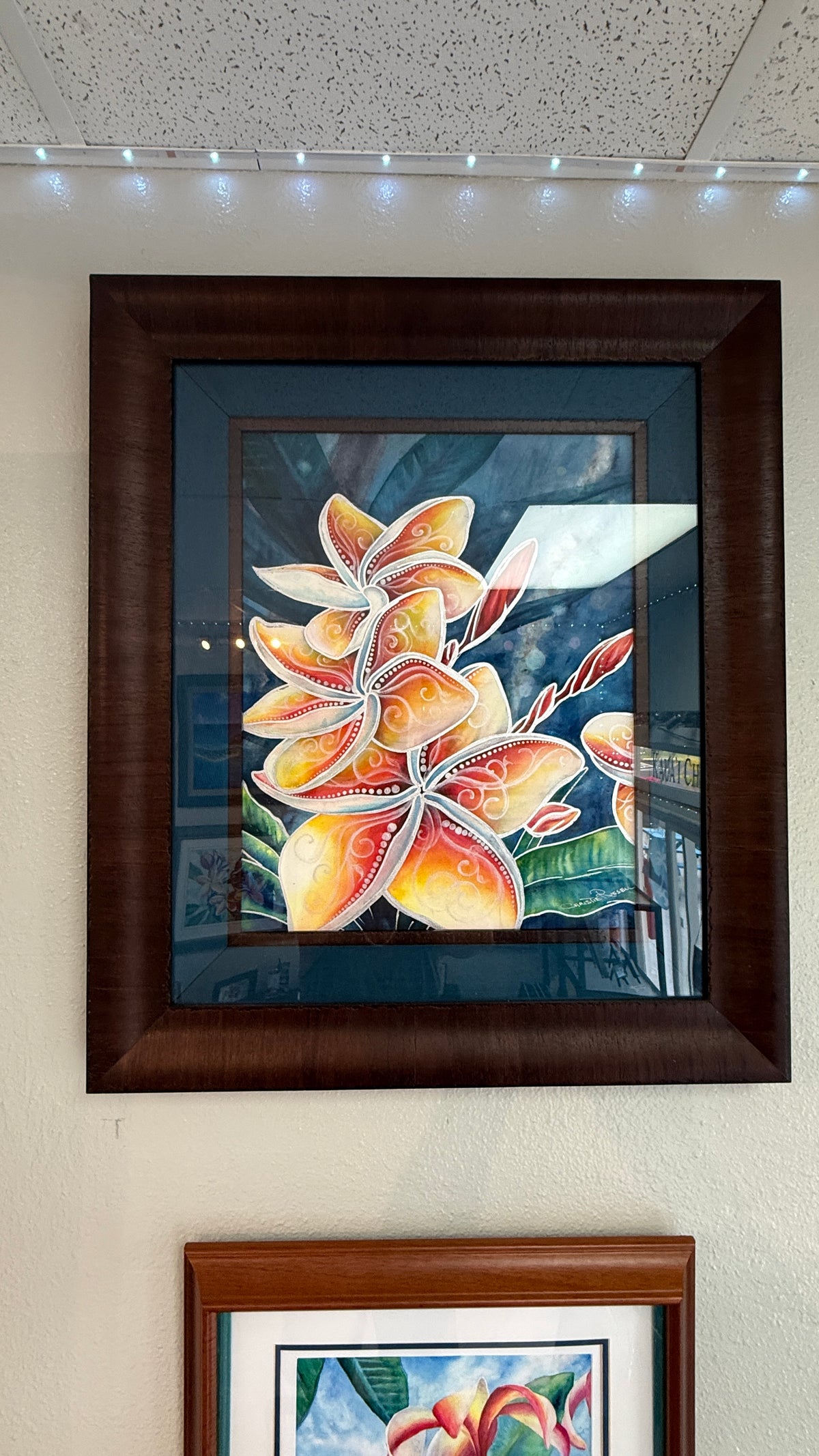 Mana displayed at Kaua‘i Christie’s Art gallery, showing the original artwork in its included frame and real gallery setting.