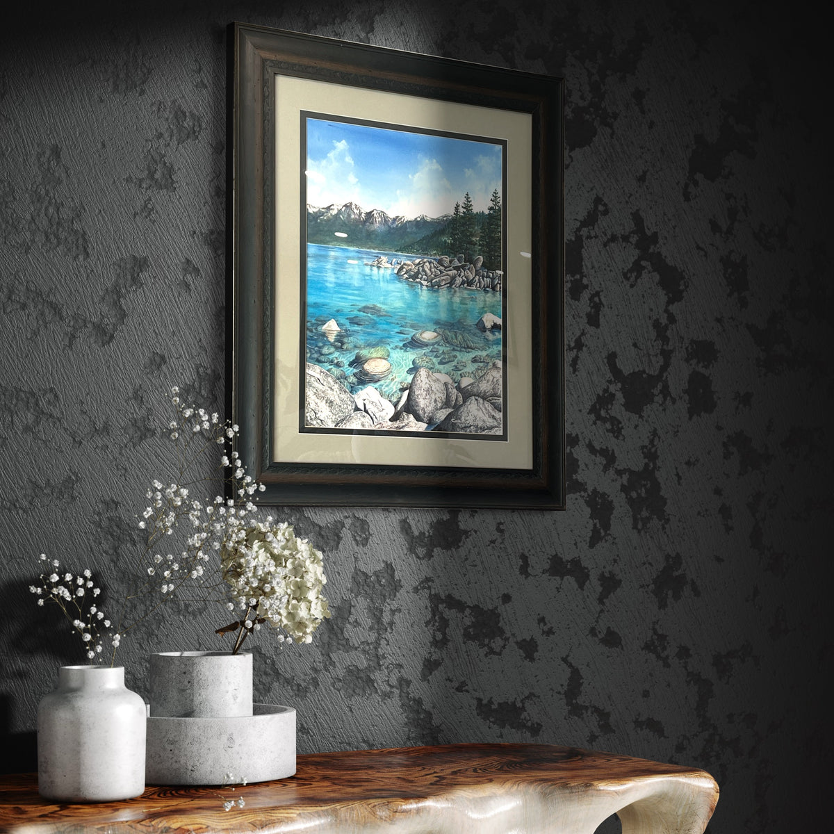Interior visualization of Clear Awakening framed Lake Tahoe watercolor displayed above a sculptural wood table