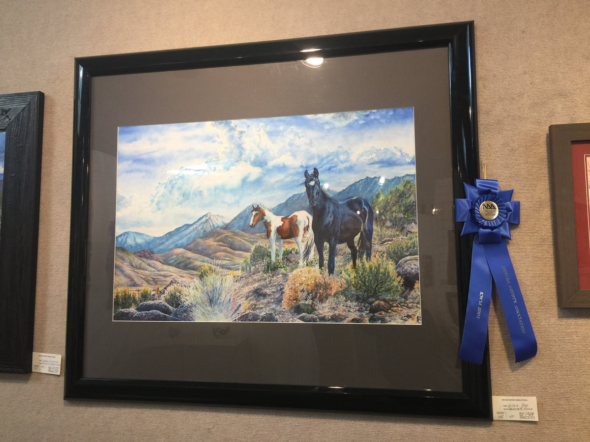 Mustangs Wild displayed in a juried Nevada Arts Association art exhibition with a First Place ribbon