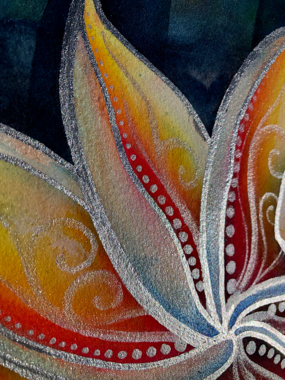 Close-up of Mana showing intricate metallic silver linework, dotted details, and gemstone watercolor accents across glowing plumeria petals.