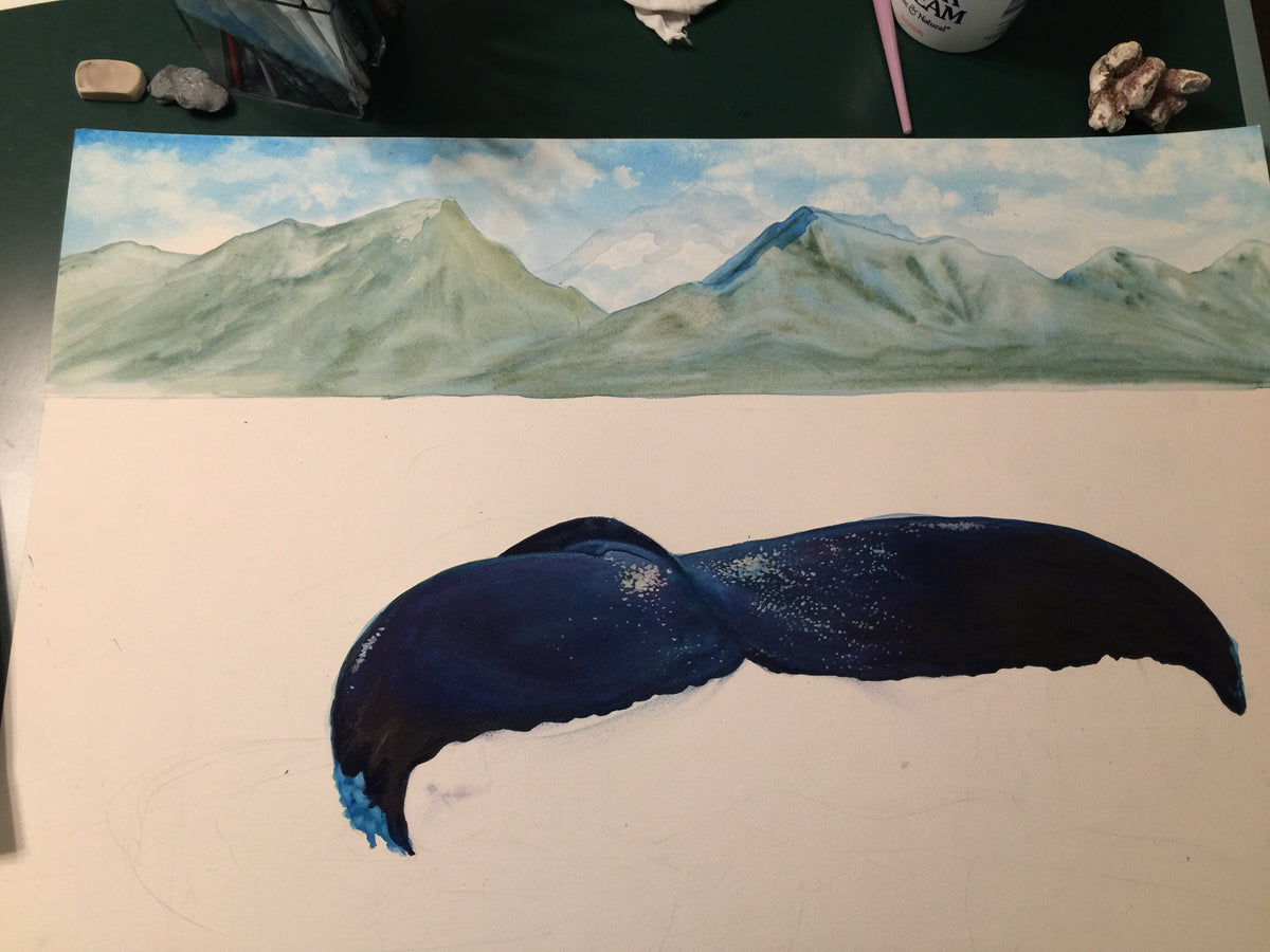Sanctuary Maui Hawaii whale tail watercolor in progress showing preserved white paper and first layers of the watercolor washes
